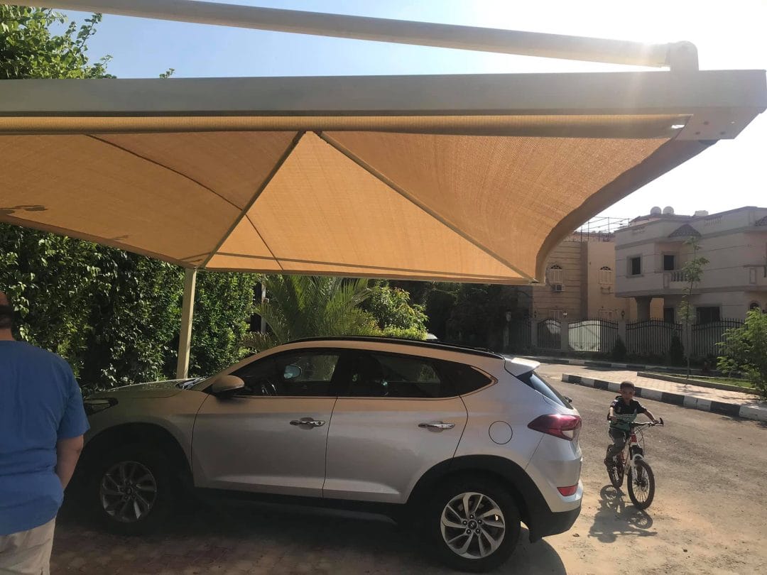 مظلات تحمي السيارات من اشعة الشمس